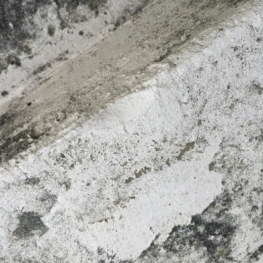 The cracked step at my feet.