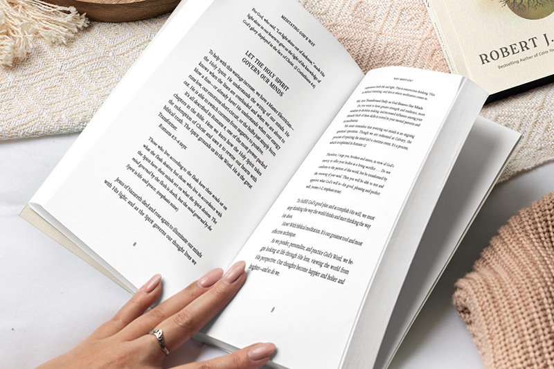 Woman reading Meditating God's Way by Robert J. Morgan